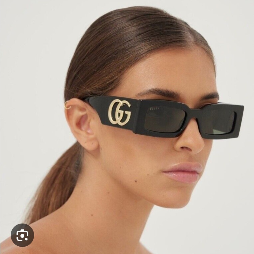 - Gucci Sunglasses